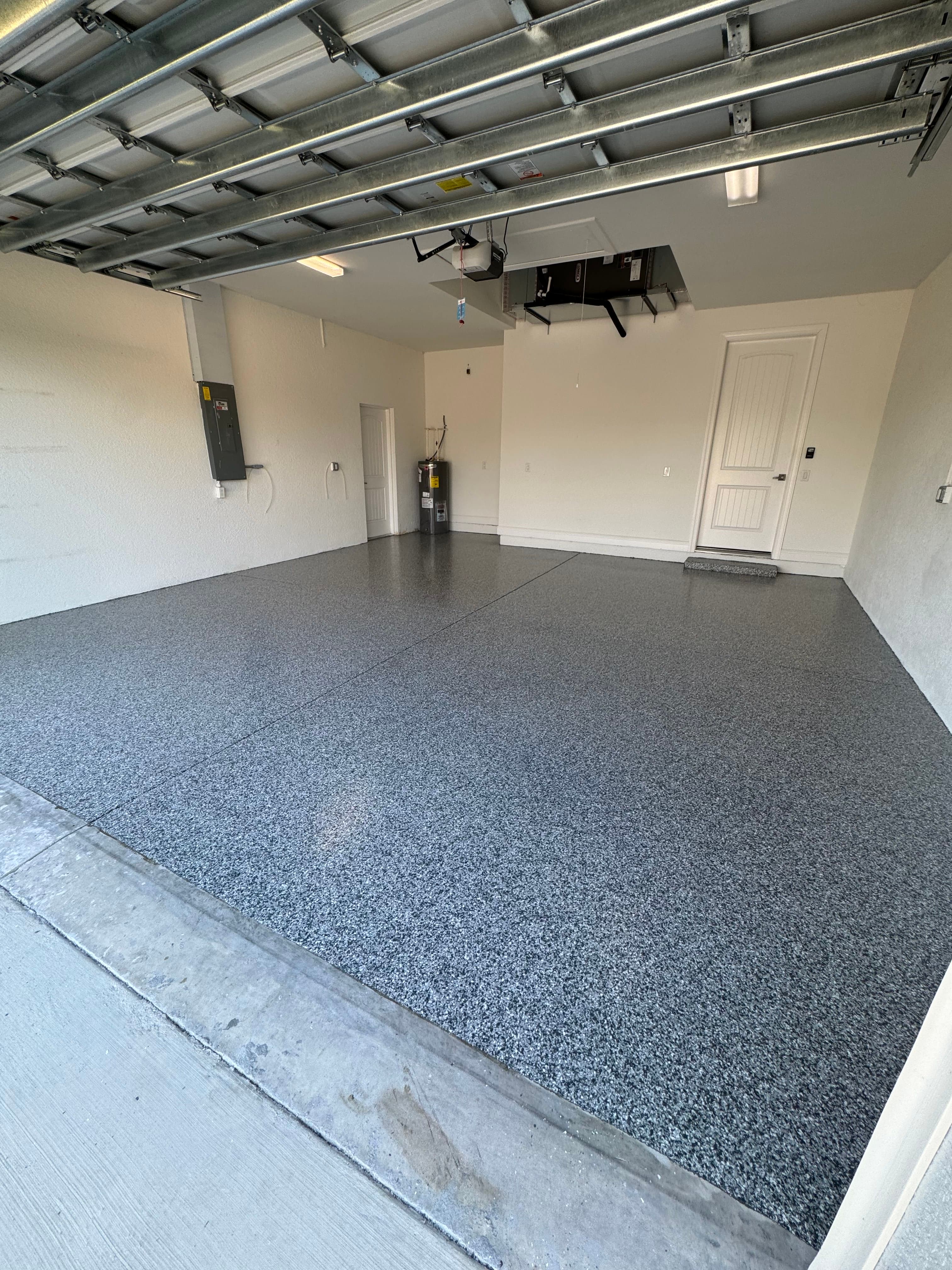 Finished garage floor with flake coating